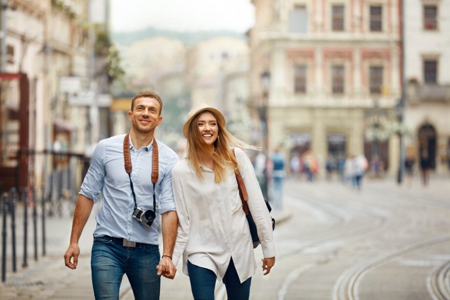 Travel. Tourist Couple Traveling, Walking On Street